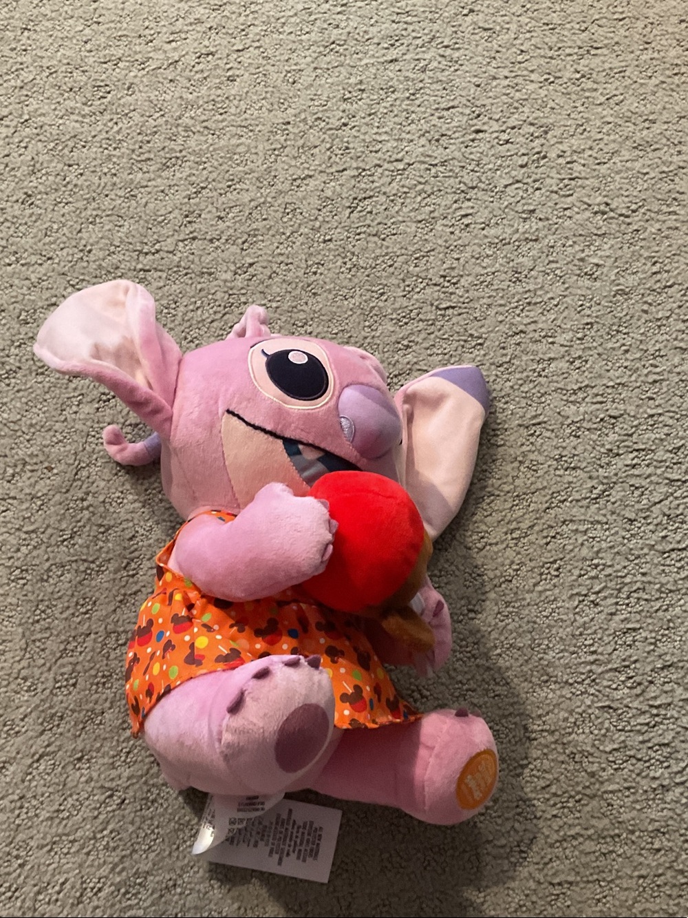 Disney Pink Stitch Plush with Orange Dress and Red Apple